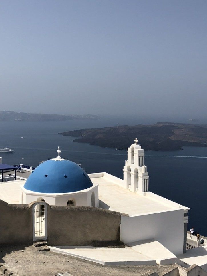 The walk of thee three bells of Fira in Santorini